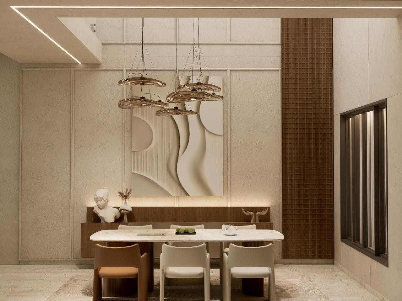 Dining room with a marble table, sculpted wall-art panel and bronze disc pendant lights