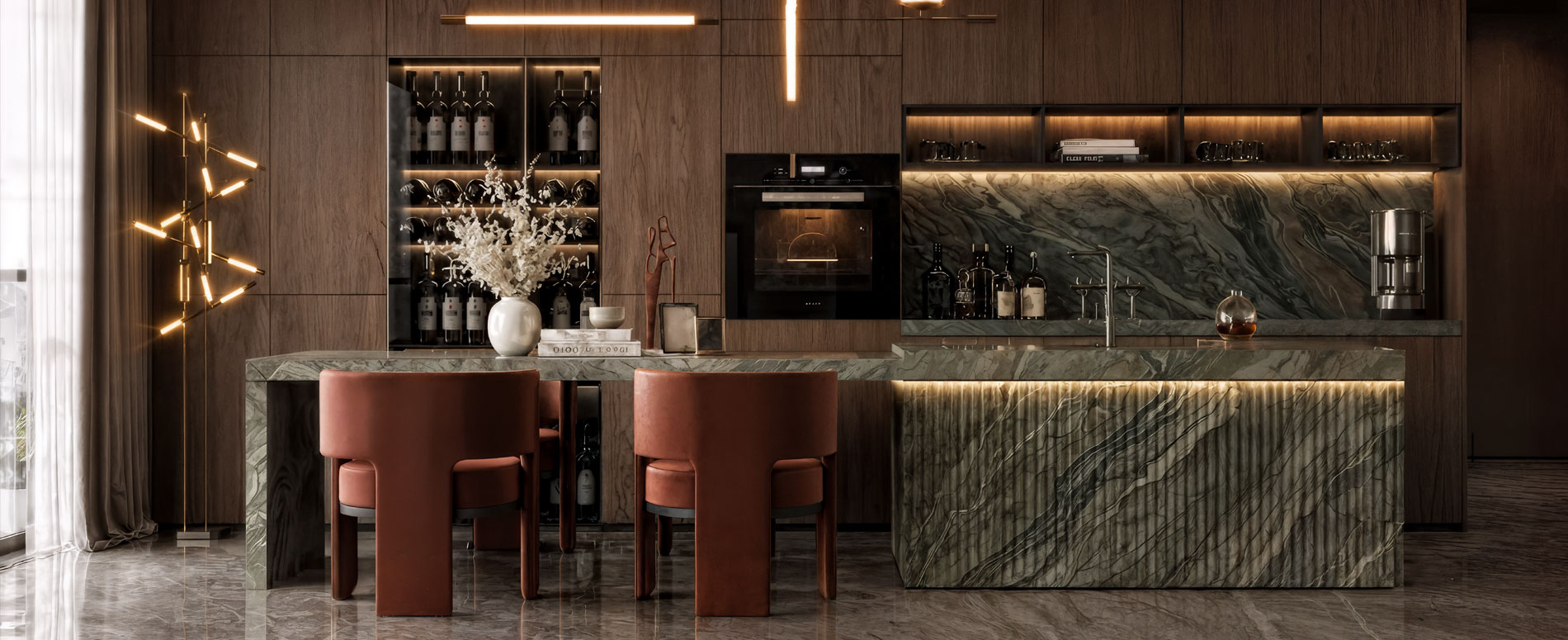 Walnut kitchen with green-marble island, brass lighting and rust dining chairs